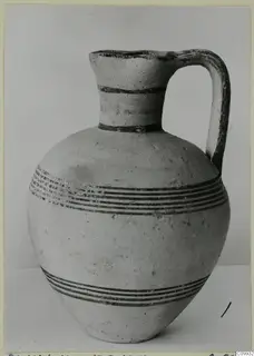 Bichrome IV jug with a single strap handle and dark painted bands