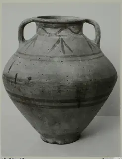 White Painted V amphora: a large two-handled jar with dark painted bands and leaf-like strokes on the shoulder