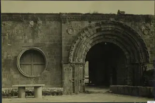 Round-arched entrance in a stone wall with carved arch mouldings, probably at Famagusta