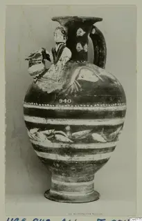 Cypro-Hell.I pottery vessel with a modelled standing figure on the shoulder and painted fish bands