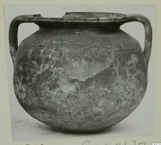Cypro-Hell. I bowl with two loop handles and a wide rim, shown in side view on a card mount