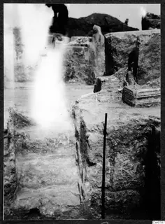 Wall and stairs at Salamis, with a person partly visible behind the stonework