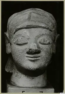 Limestone head sculpture with closed eyes, on a square base; Neo-Cypriote, British Museum