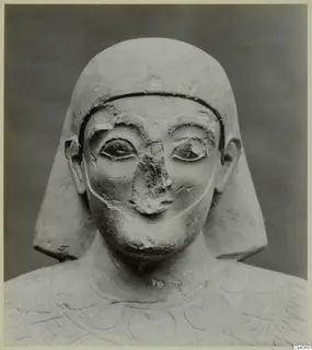 Limestone statue head and shoulders, Proto-Cypriote, face frontal, nose broken