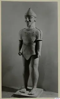 Terracotta figure of a standing bearded male with a conical cap, catalogued as Terracotta Proto-Cypriote I