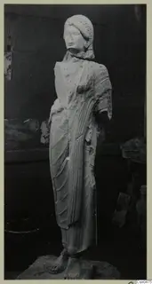 Limestone statue of a standing figure in a long draped garment, from Vouni