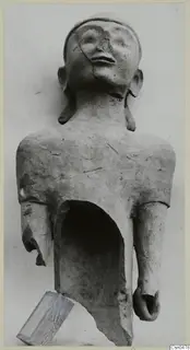Terracotta figure from Ayia Irini: upper body with head, hollow torso and broken arms