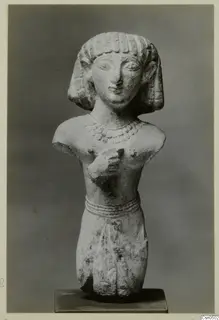 Limestone Cypro-Egyptian figure, head and upper body, rising from a square base