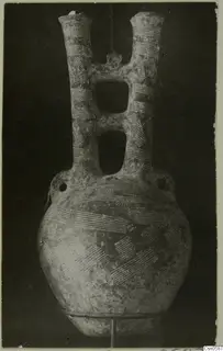 Double-spouted pottery vessel with bands and hatched patterns painted in pale line, a find from Cyprus, Cyprus Museum.