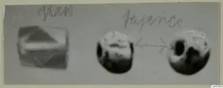 Grey card with blurred photographs of a rectangular object and two round objects, joined by a drawn arrow, with handwritten labels.