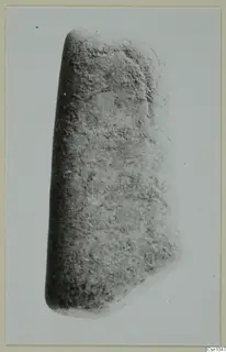 Thick grey stone object with a rough surface, small find from Lapithos, Vrysi tou Barba tombs