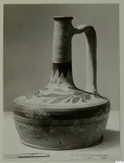 Cypro-Hell. II jar with a strap handle and painted leaf decoration on the shoulder