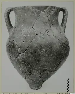 Red Polished I pottery vessel from Vounous, with two loop handles and a narrow base.