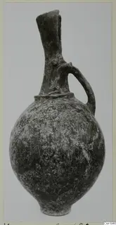 Red Polished I vessel from Vounous, with a single loop handle and a tall neck