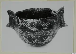 Pottery Red Polished I bowl from Vounous with two horn-like lugs and incised chevron bands