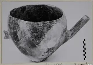 Pottery Red Polished I vessel with a tubular side spout, from Vounous