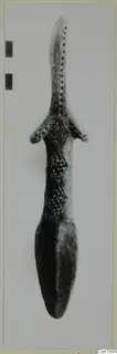 Pottery vessel with a long perforated neck, flaring shoulder projections and an incised lozenge pattern on the body