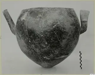 Pottery Red Polished I vessel with two tubular spouts, from Vounous
