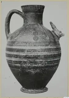Jug with a strap handle and a modelled animal head on the shoulder, from Marion