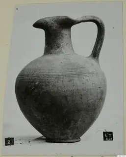 Pottery jug from Lapithos with a beaked spout and strap handle