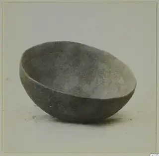 Rounded grey bowl tilted towards the viewer, from Ayios Iakovos