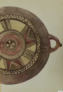 Drawing of a Black Slip Bichrome dish with a loop handle and radiating panels in brown and red