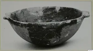 Pottery Reserved Ware bowl from Vounous with two small handles and dark painted bands
