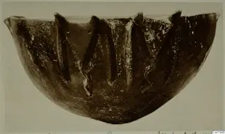 Pottery Red Polished III bowl from Vounous, with a vertical ridged pattern on its body