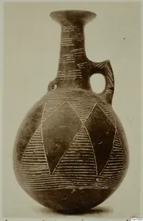 Red Polished II jug from Vounous with incised horizontal lines and diamond-shaped panels