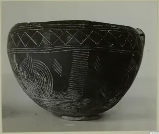 Bowl with incised diamond-lattice and spiral decoration, from the Vrysi tou Barba tombs at Lapithos