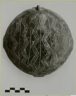 Pottery Red Polished II Bowl, a rounded vessel with incised zigzag bands and vertical lines