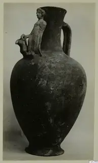 Pottery vessel with a moulded female figure on its shoulder, from Marion tombs 31–45