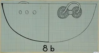 Drawing of a bowl on graph paper, showing a curved loop handle with two disc-shaped rosettes and small oval marks on the body
