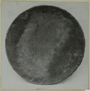 Shallow bowl from Arsos, seen from above against a pale card background