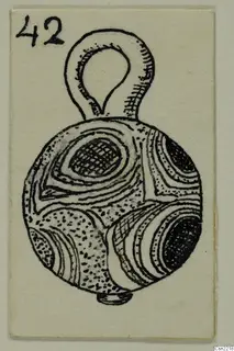 Ink drawing of a round bead or pendant with a loop at the top and concentric ring decoration