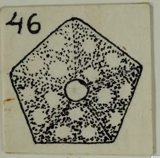 Drawing of a flat pentagonal object with a central hole and a stippled dotted pattern, with a number label in the corner