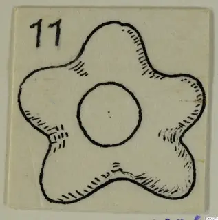 Drawing of a flat five-lobed object with a central hole, with a number label.