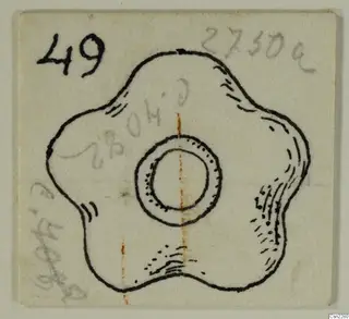 Ink drawing of a flat object with five rounded lobes and a large central hole, drawn on a small card