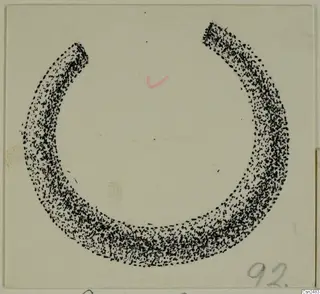 Stippled ink drawing of an open silver ring on pale card, with a number label in the lower right corner