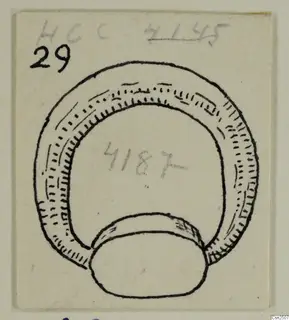 Ink drawing of a thick ring-shaped object with a rounded element at its base, on a card