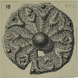 Stippled drawing of a silver object, roughly circular and flat, with a number label at top left