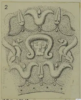Stippled drawing of a decorated object with a human face framed by curling scroll forms