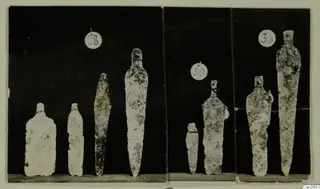 Eight metal blades with tangs, shown in three photographed groups, each with a round number label.