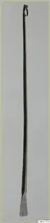Long bronze tool with a loop at the top and a flattened, splayed blade at the bottom