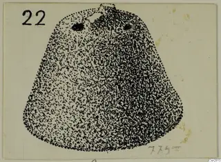 Stippled ink drawing of a bronze horse-trapping, cone-shaped, with two round holes near the top