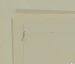 Faint pencil sketch of a small upright figure on a cream sheet of paper, with a thin guideline beside it.