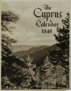Printed calendar cover with a photograph of pine trees in the foreground and wooded mountains beyond, Troodos