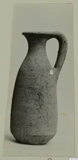 Pottery Plain White VI, a handled jug with a tall narrow neck, photographed against a plain background