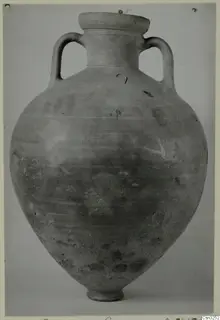 Large two-handled storage jar with a wide flat rim, shown against a grey backdrop.