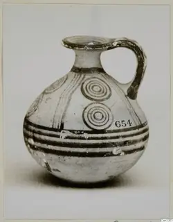 Pottery White Painted V: jug with a strap handle, concentric-circle motifs and dark horizontal bands